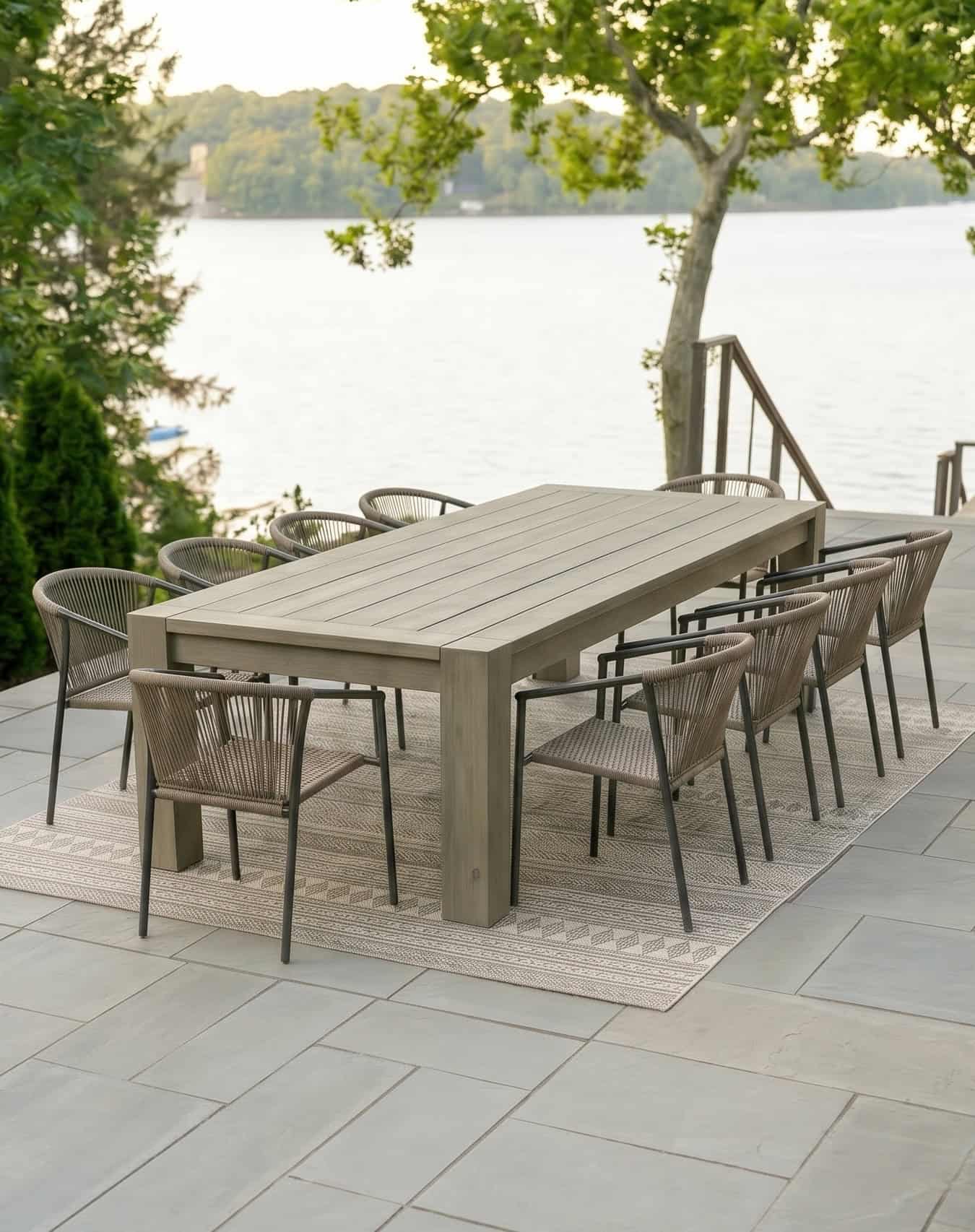 DIY Pottery Barn knockoff outdoor table set on a lakeside patio at golden hour.