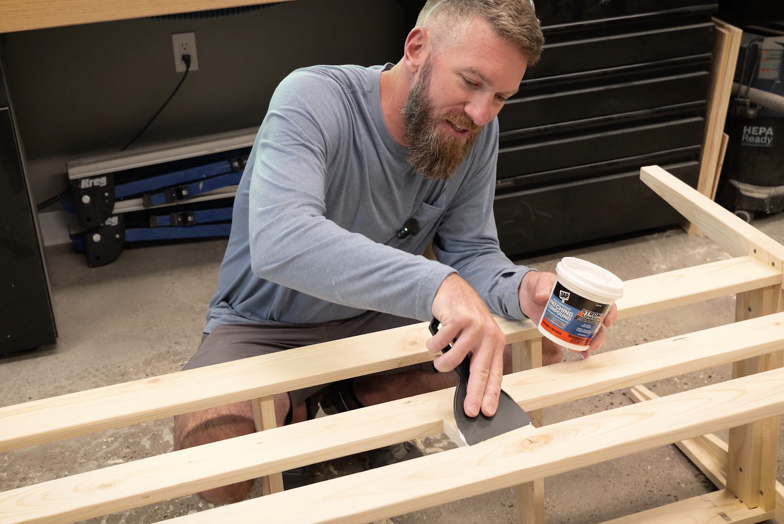 Filling the pocket holes with weatherproof patching compound