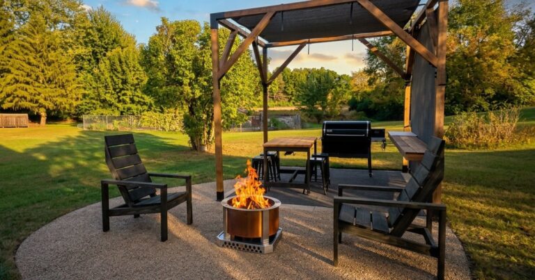 Finished 10x10 pergola with fire pit patio, bar, and shade