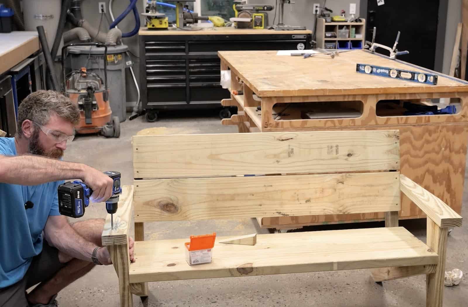 Fastening the triangular arm support under the arm rest