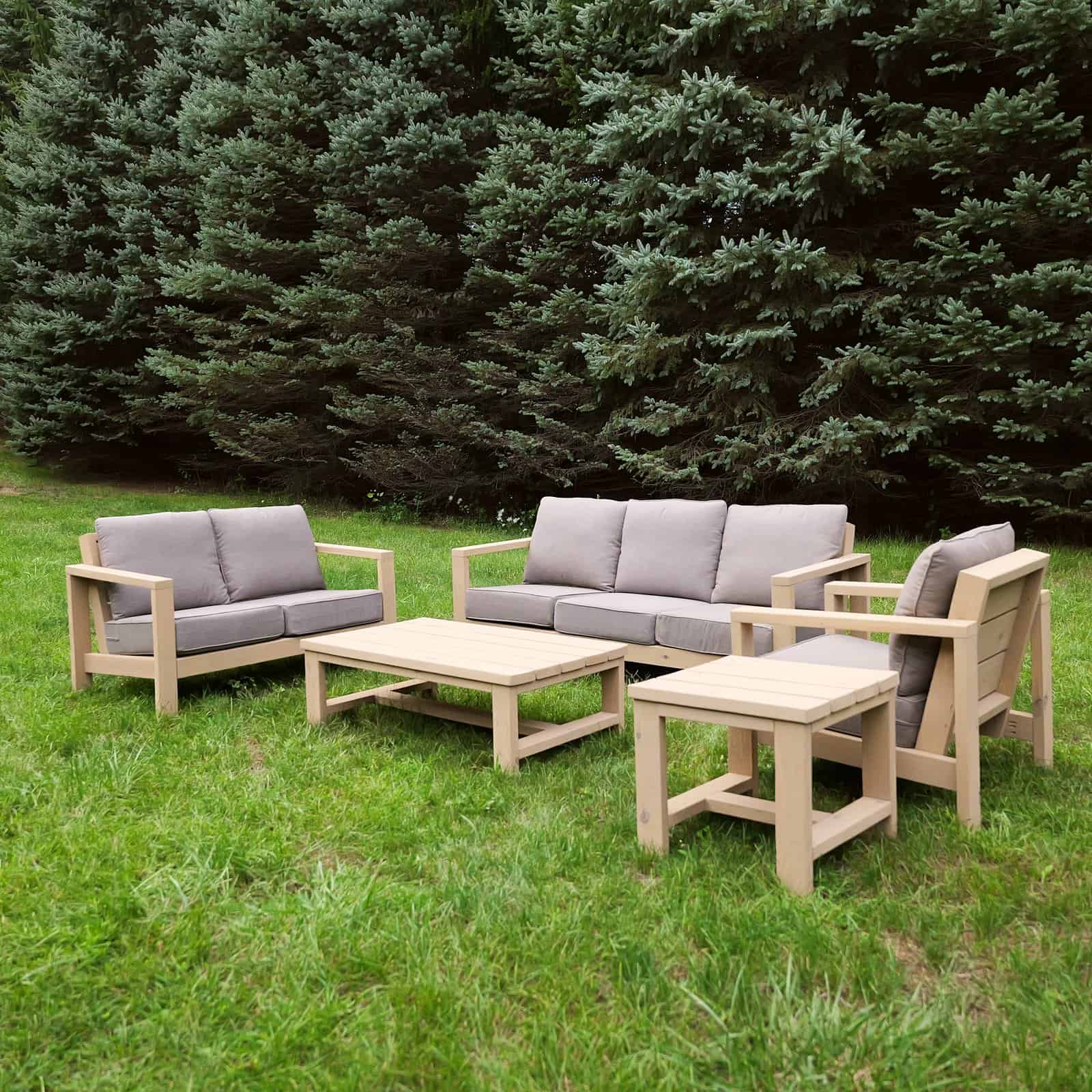 DIY patio furniture set with outdoor couch, loveseat, chair, coffee table and side table built from 2x4s and 2x6s