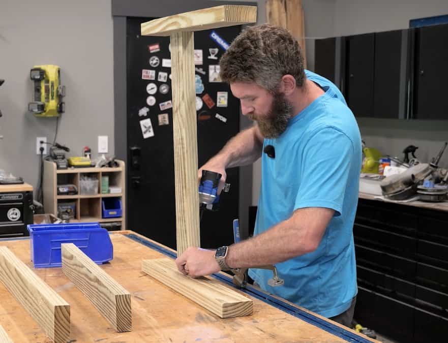 Attaching the side rail to the leg of a DIY outdoor chair with pocket screws