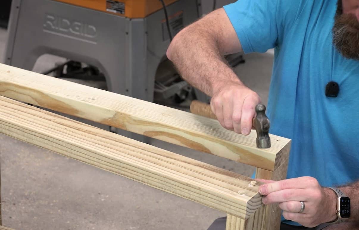 Hiding armrest screws with wood plugs on a DIY outdoor chair
