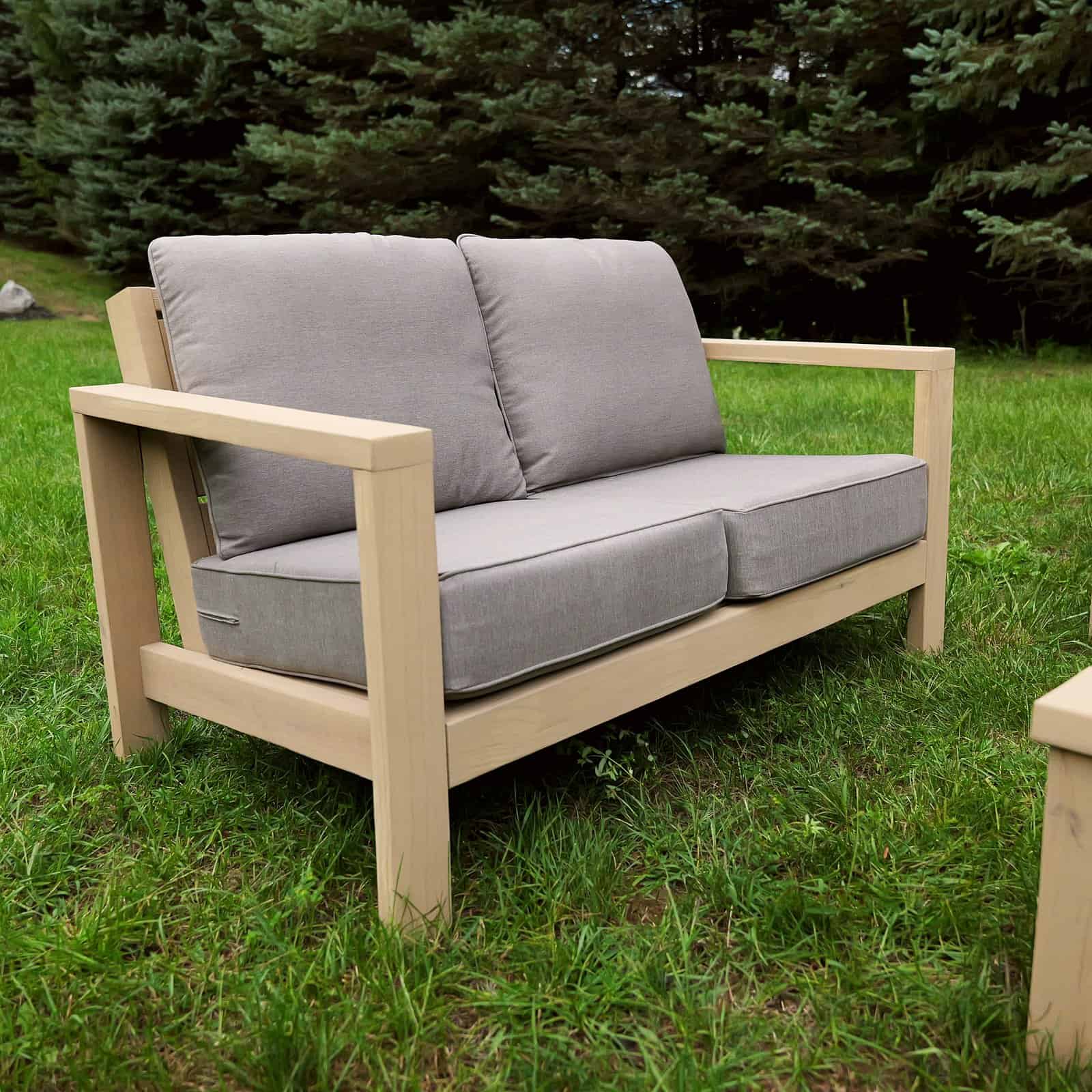 Finished DIY outdoor loveseat built from 2x4 and 2x6 lumber