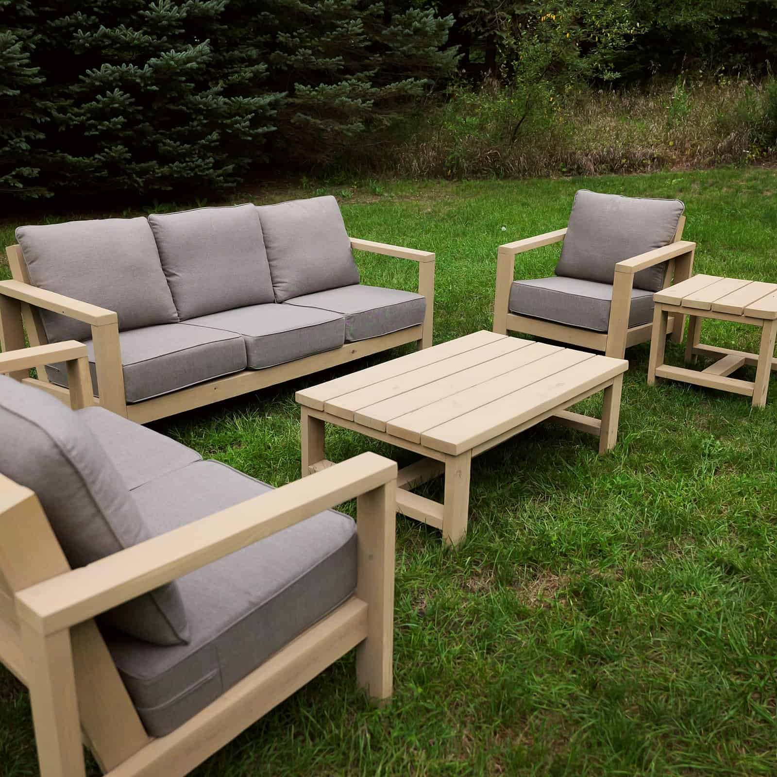 DIY patio furniture set arranged as an outdoor sectional around the coffee table