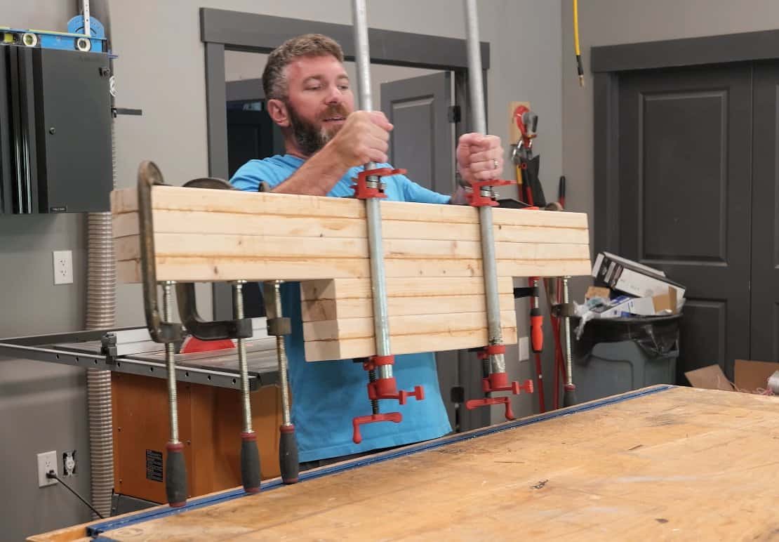 Pairs of 2x4s glued face to face in clamps for the bed legs