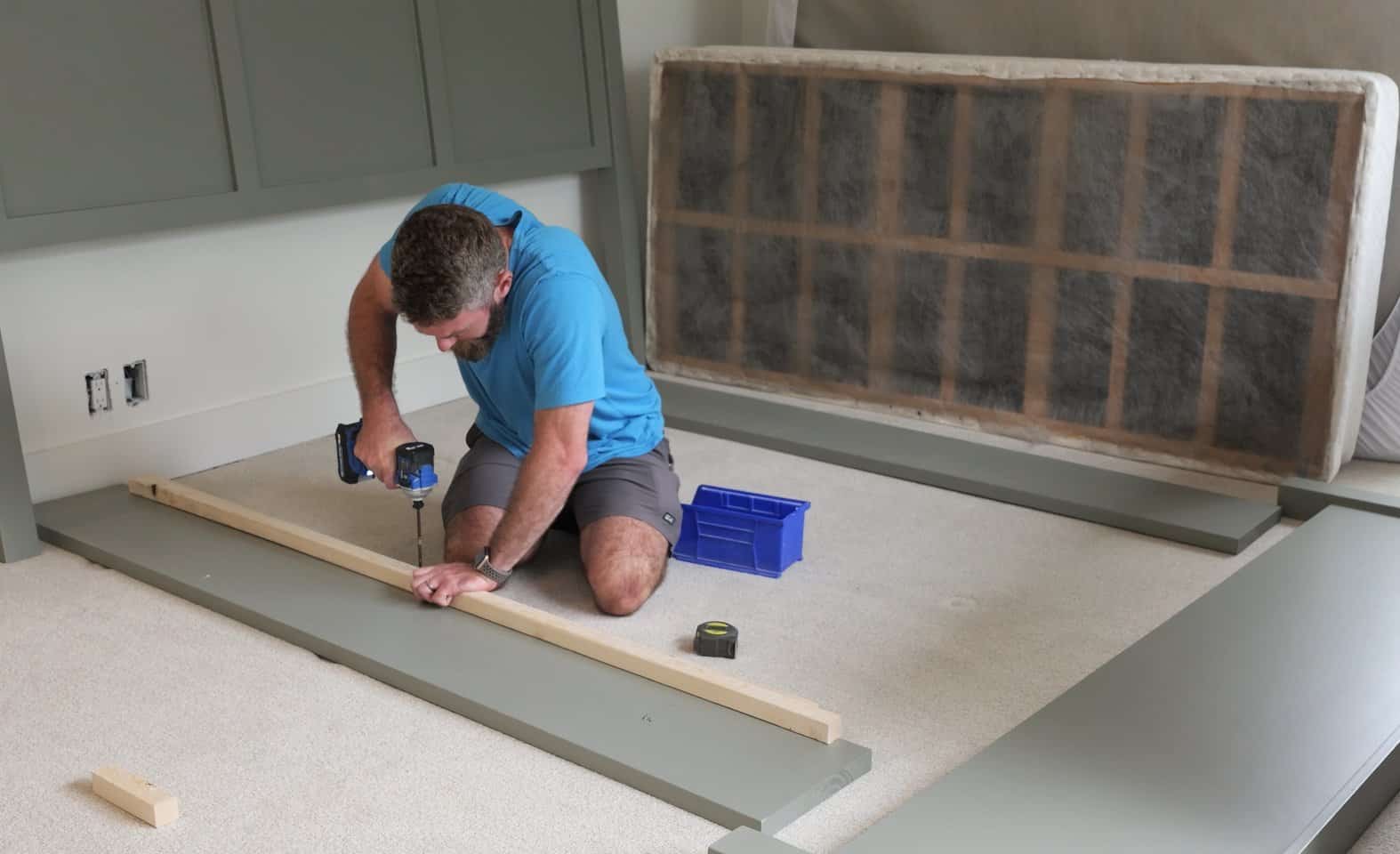 Screwing a 2x2 cleat to the inside of a 2x12 side rail