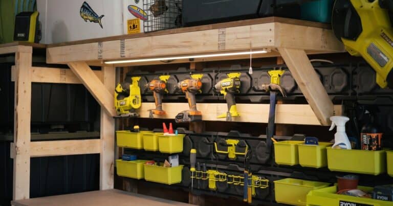 DIY garage shelf above a workbench, built from 2x4s and plywood