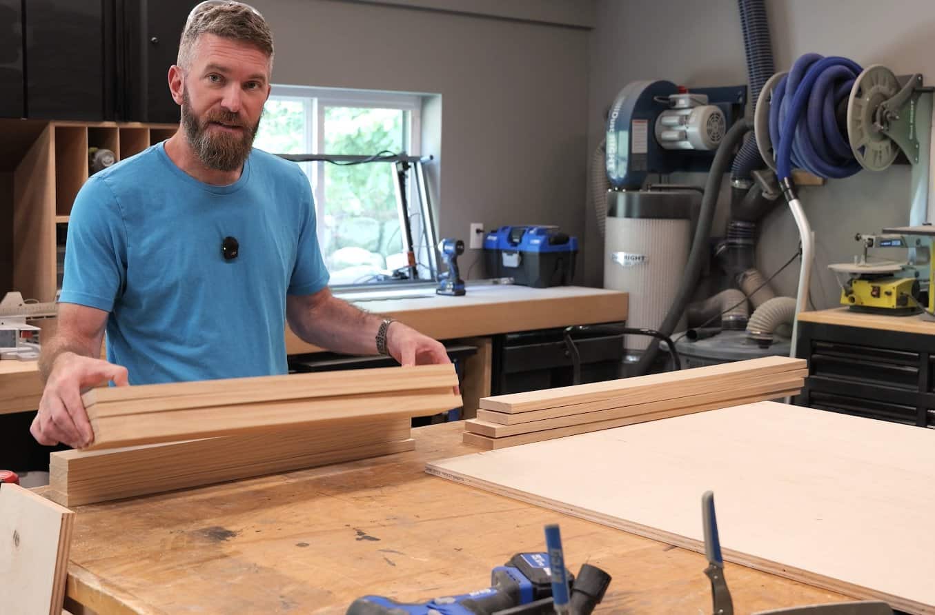 Half sheet of plywood with 1x4 and 1x3 select pine boards for a DIY mahjong table