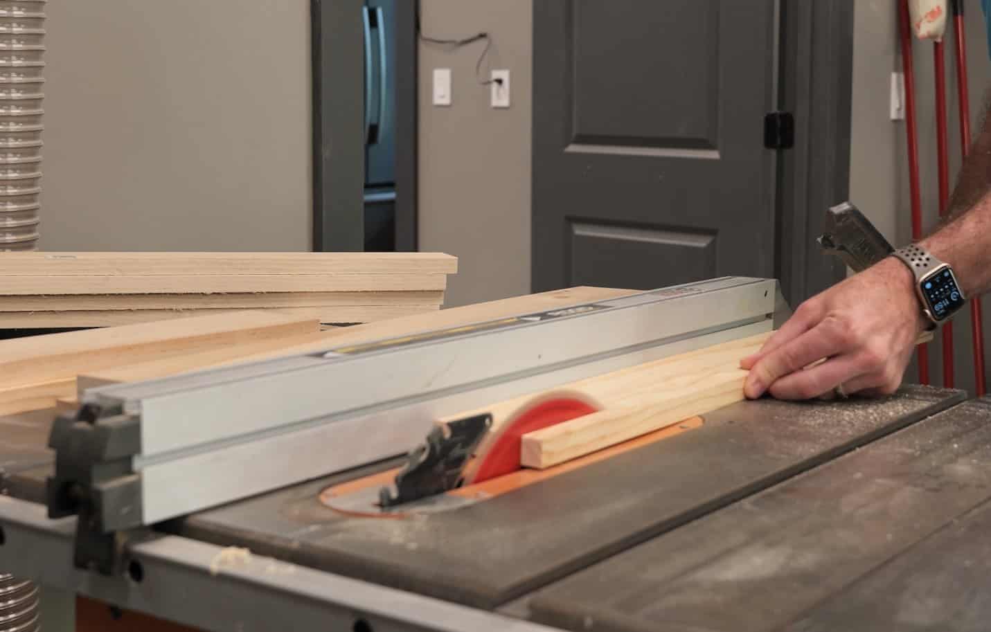 Ripping 1x3 pine to 2 inches on a table saw for mahjong table legs