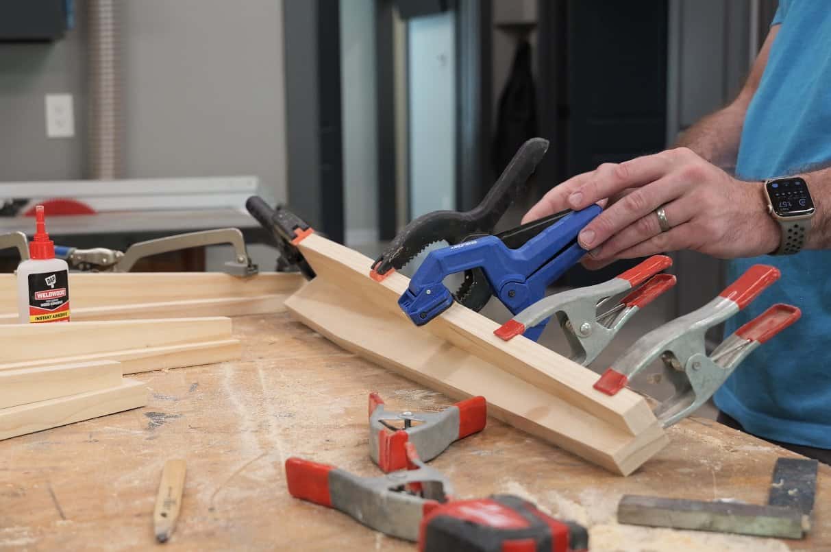 Gluing tapered pine boards into an L shaped leg for a DIY mahjong table