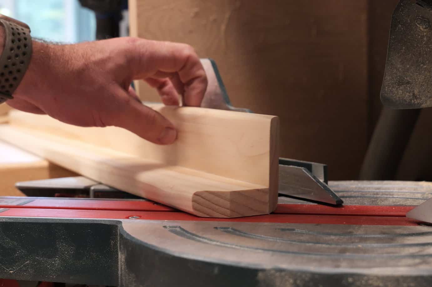 45 degree corner relief on a folding table leg so it can rotate on the bracket