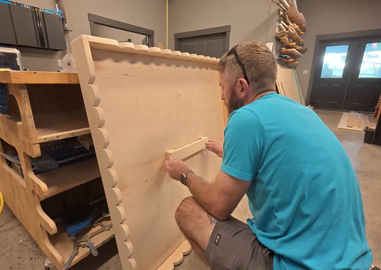 Attaching the carry handle to the underside of a DIY mahjong table top
