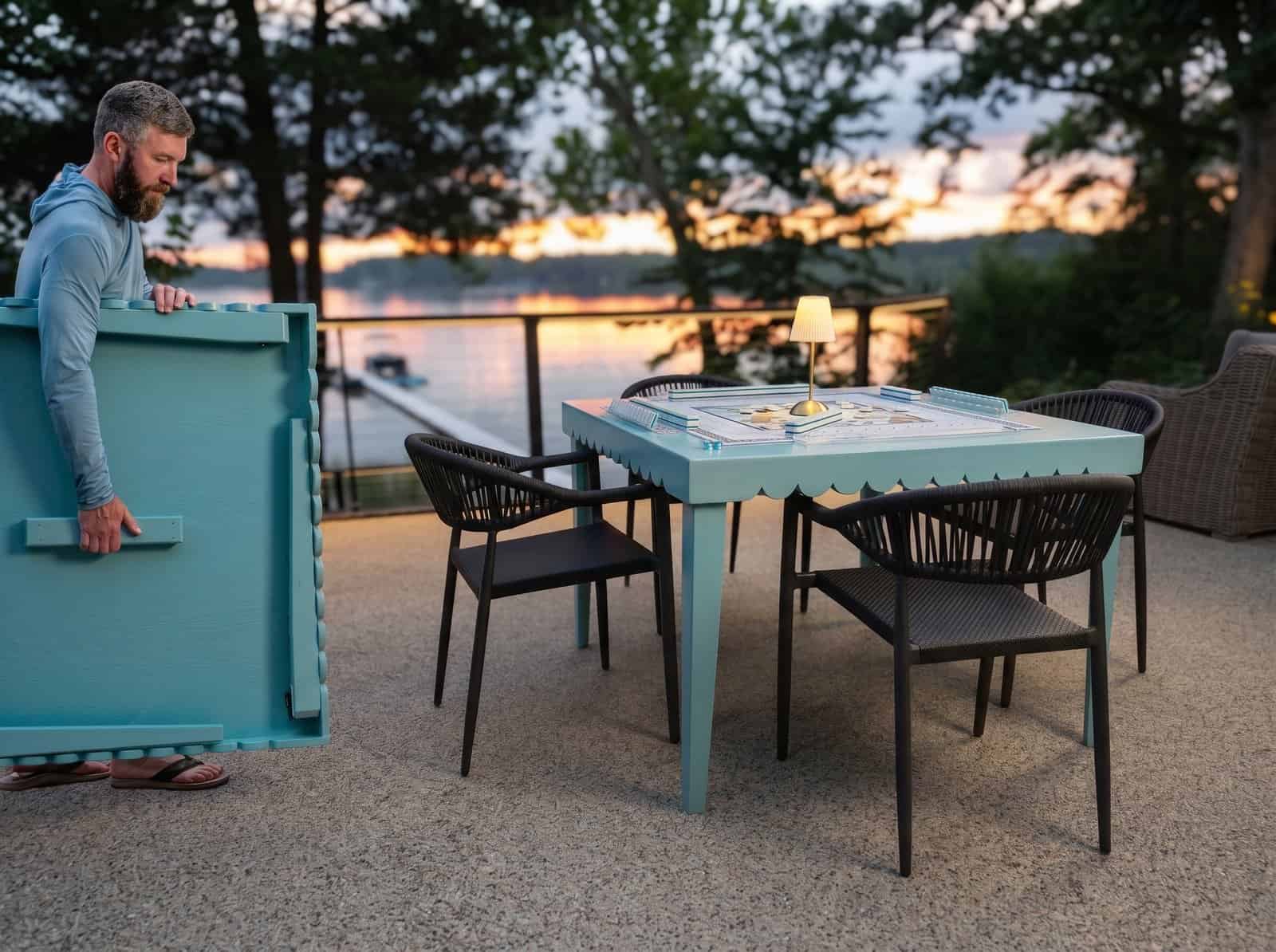 Finished DIY mahjong table set for a game next to the same table folded flat and carried by its handle