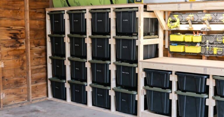 DIY tote storage rack built from 2x4s holding 16 totes