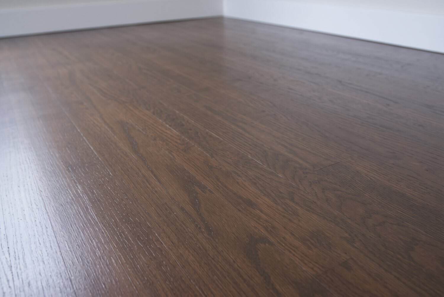 Refinished oak hardwood floor stained Briarsmoke with two coats of floor finish
