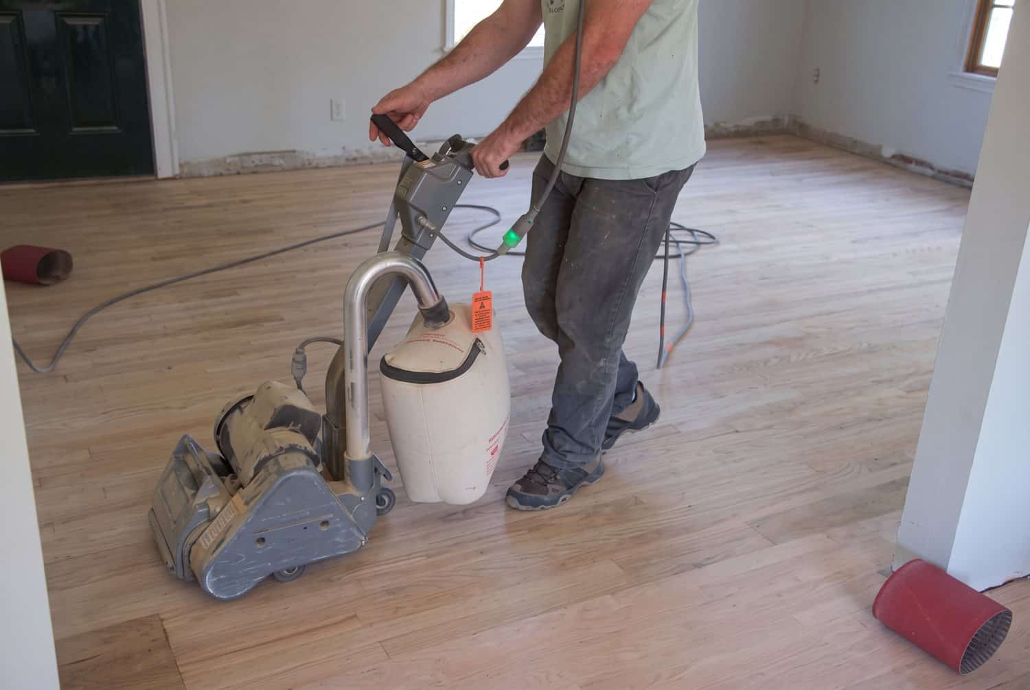 First pass with the rented drum sander at 36 grit, with the grain