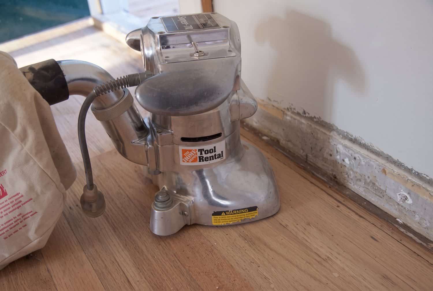 Edge sander at 36 grit along the wall